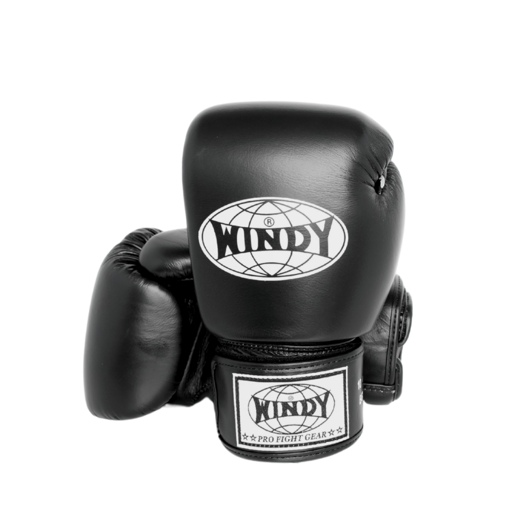 Front and rear angled view of a pair of black Windy BGVH leather Muay Thai boxing gloves showing padded knuckles, Windy logos, wrist straps and hook-and-loop closures on a white background