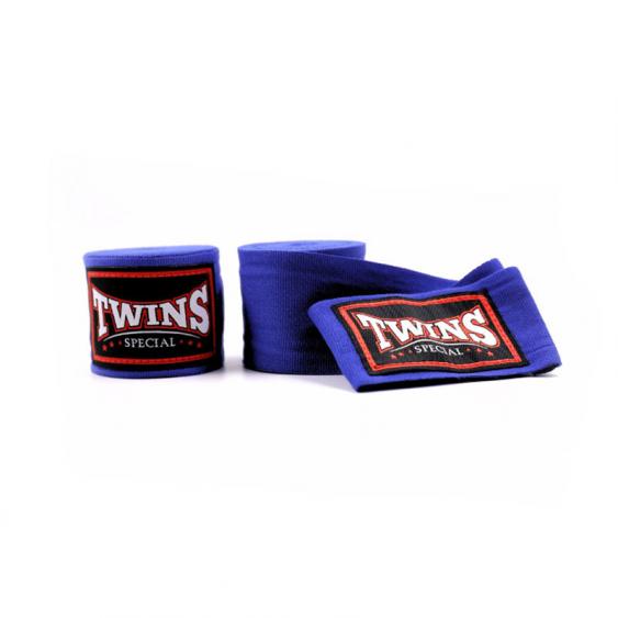 Blue Twins Special boxing hand wraps with embroidered Twins logo patches displayed on a white background
