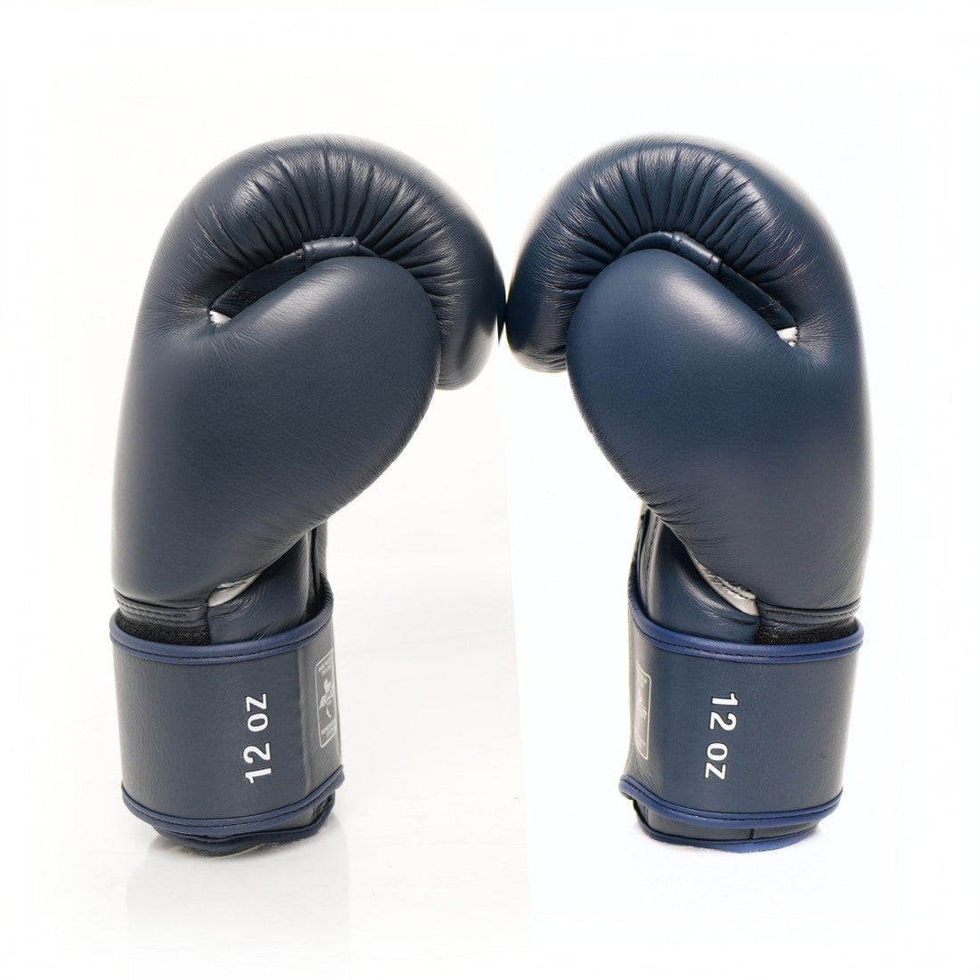 ARWUT BG5 The Ascent Oxford Blue boxing gloves, side view of leather pair with 12 oz wrist markings and white branding on a white background