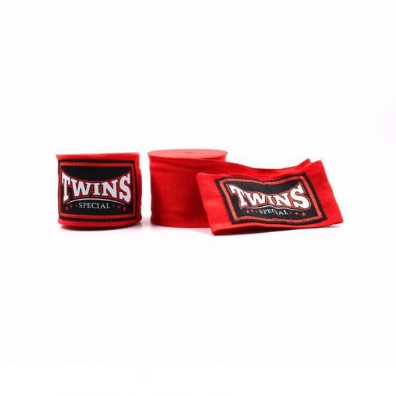 Red Twins Special boxing hand wraps with embroidered Twins logo patches displayed on a white background