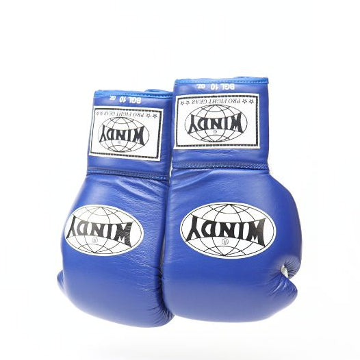 Close-up view of blue and white Windy BGL lace-up boxing gloves showing white laces, black edging, stitched leather and Windy branding on a white background