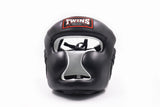 Twins Special HGL3 sparring headgear with high-density foam cheek and chin protection, lace-up top and hook-and-loop back closure for boxing, Muay Thai and kickboxing on a white background