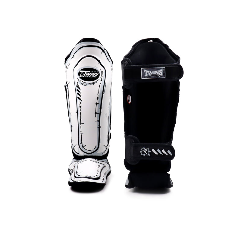 Additional view of Twins Special FSGL10-66 COMIC leather shin guards showing reinforced instep padding, contoured shin protection and hook-and-loop strap closure on a white background