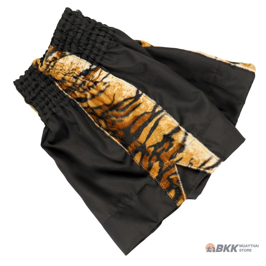 Rear view of black and yellow ThaiSmai TIGER Muay Thai shorts showing the elastic waistband, back panel and tiger-themed artwork on a white background